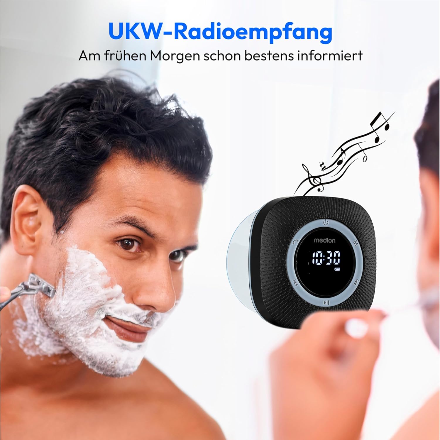 MEDION P66096 MD43884 Shower Radio displaying FM frequency while a man shaves
