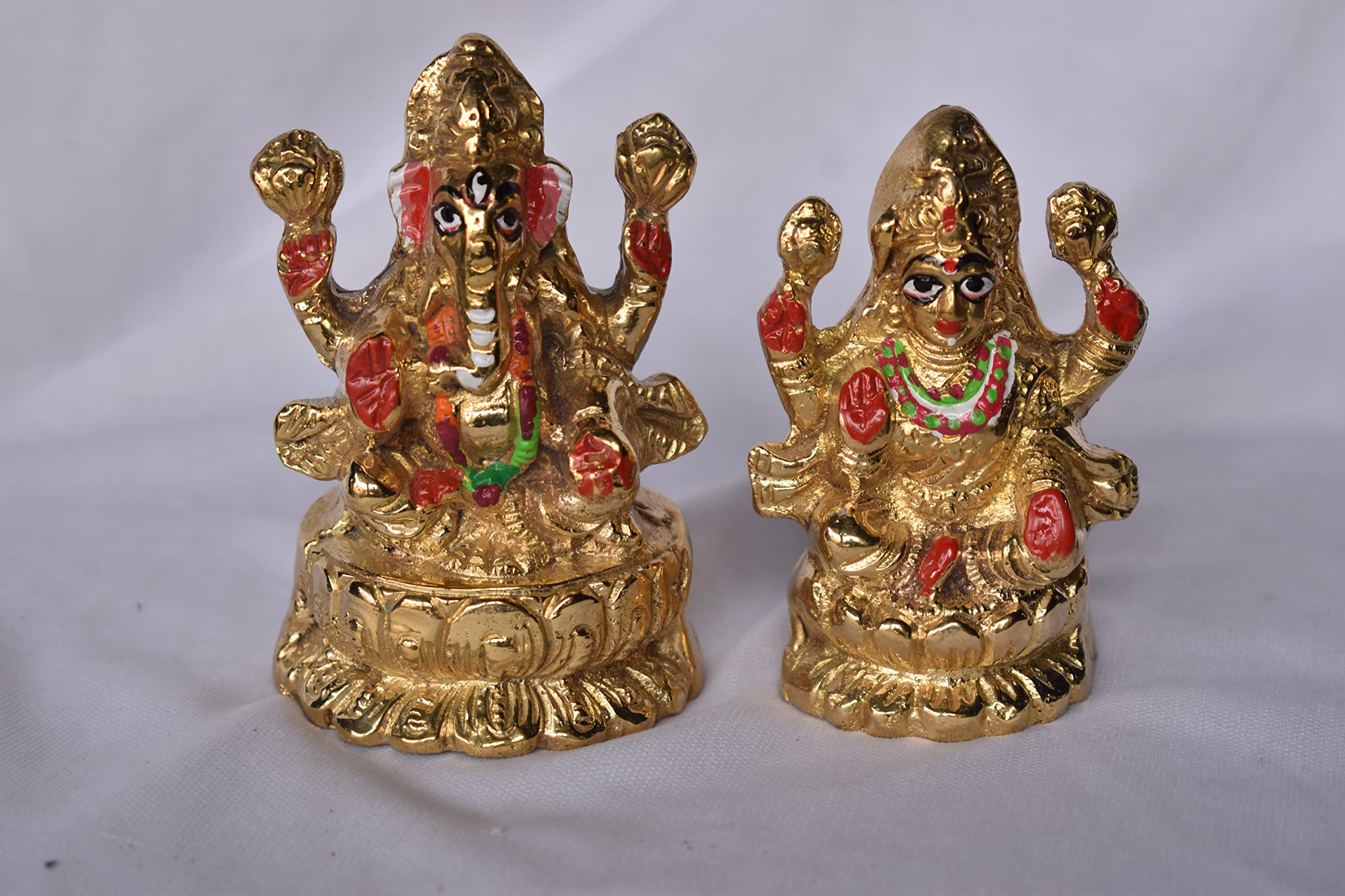 LNDS 4 Hand Barss Metal Laxmi Ganesha Idol Height 4 Inch/Length 5 Inch/Weight 2.5 CM Color Gold