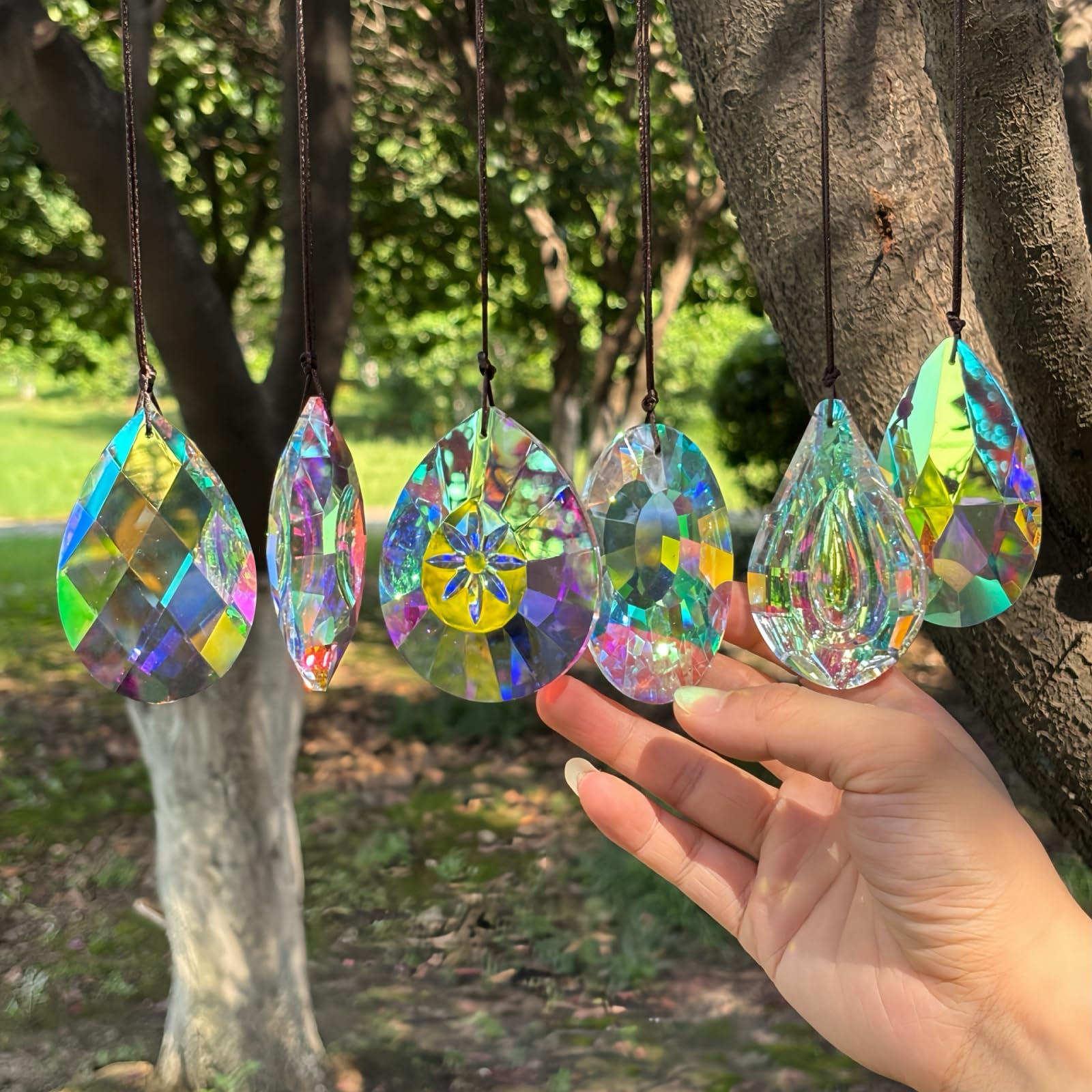 Photo 1 of 6Pcs Crystal Sun Catcher Prisms, Suncatchers for Windows Hanging, AB Colored Chandelier Crystals Prisms for Room Garden Rainbow Maker Pendants Home Decor