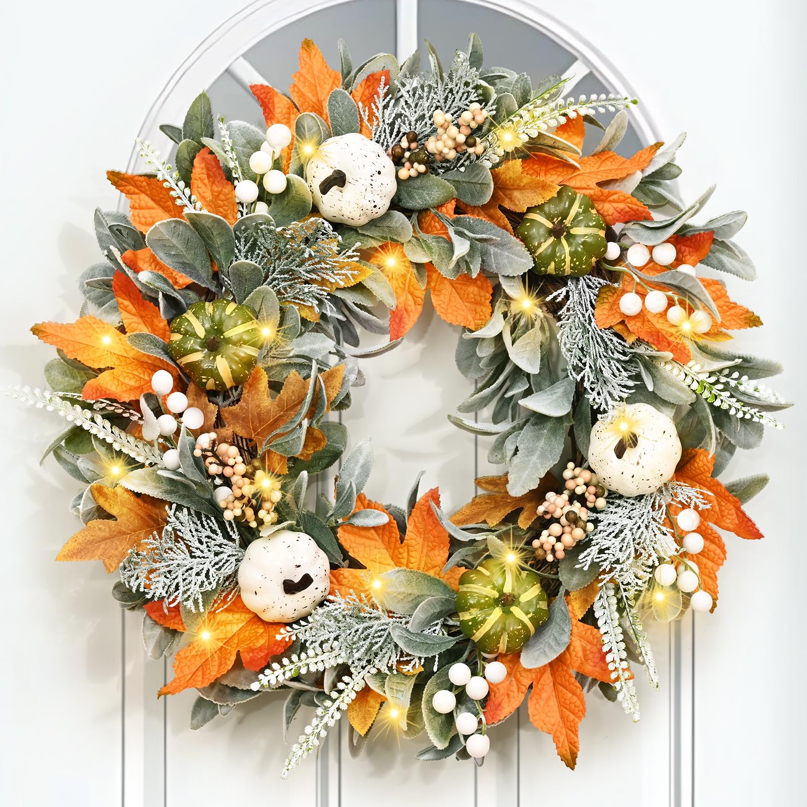 Couronne de porte d'automne avec feuilles oreilles d'agneau et baies