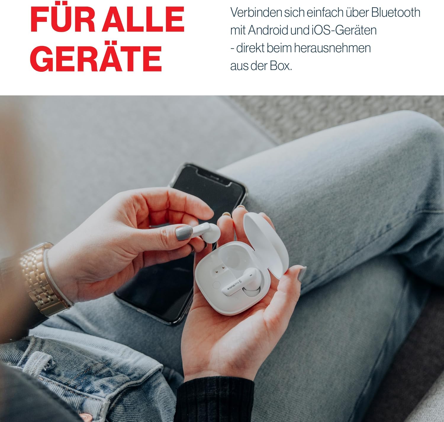 Person connecting freeVoice Wave 500 earbuds to a smartphone