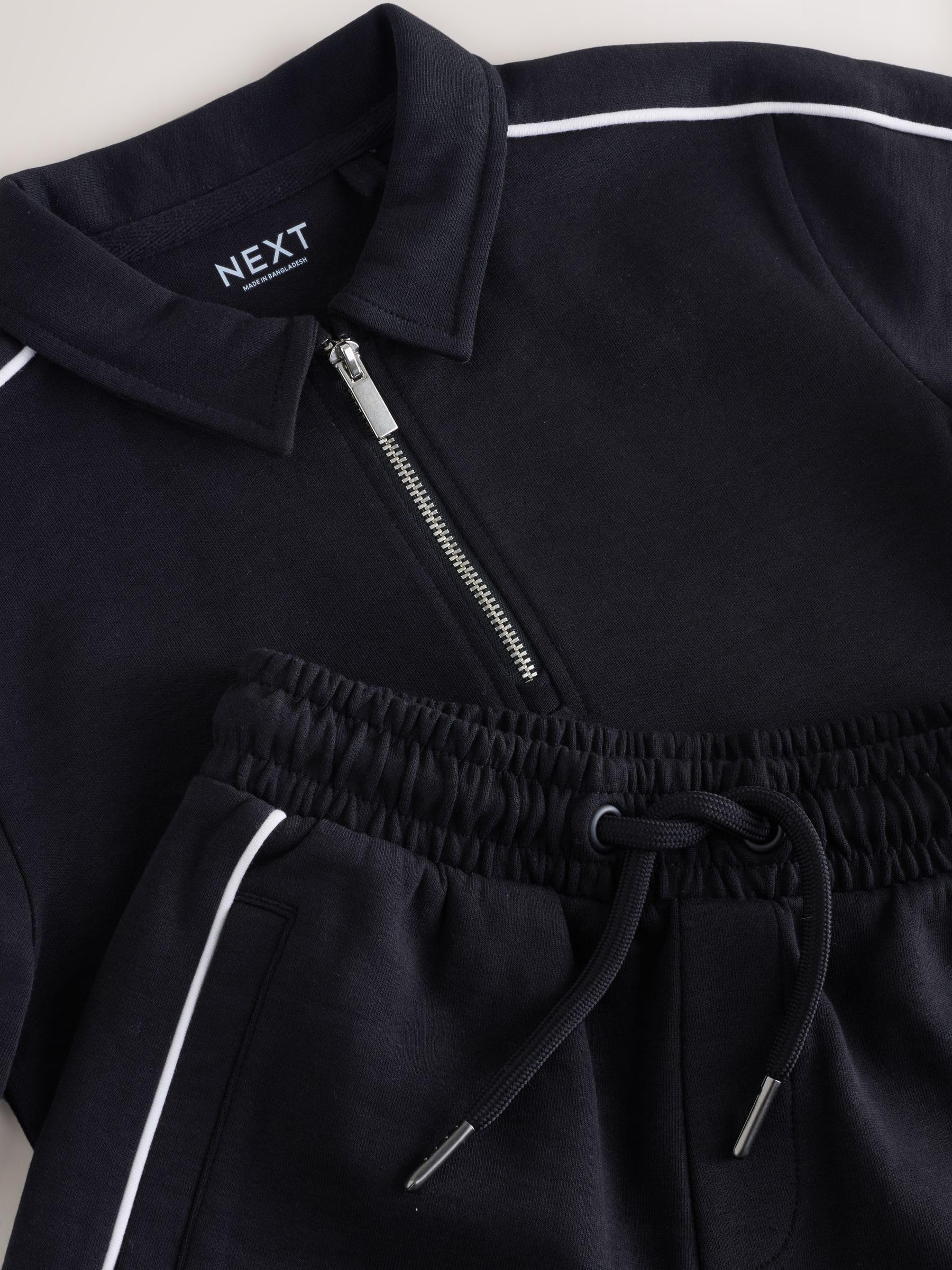 NEXT Niños Conjunto de polo con cuello con cremallera y pantalones cortos