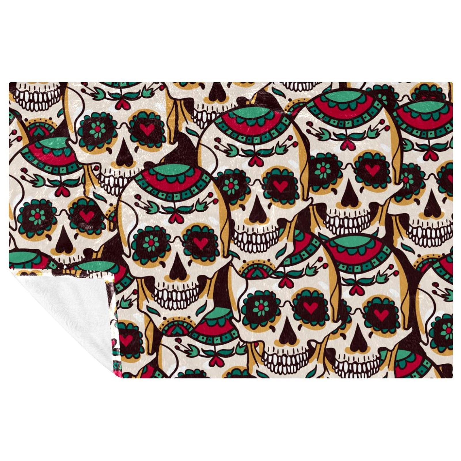 Couverture tête de mort mexicaine chaude contre le froid sur le lit ou au camping