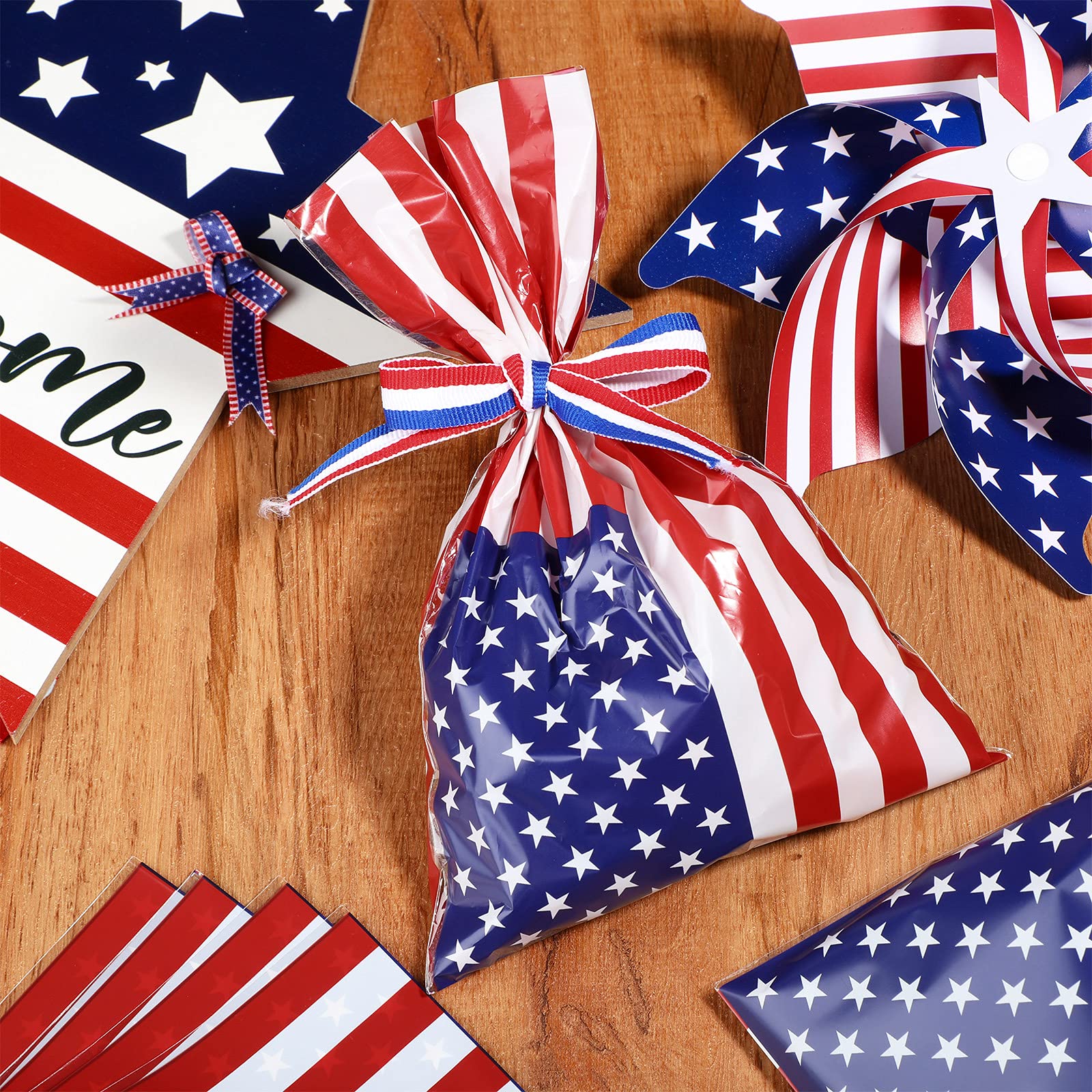 Tenare 100 Pcs Patriotic Gift Cellophane Bags Bulk Plastic Red White Blue American Favor Flag Cellophane Bags 4th of July Treat Goodie Candy Pouches with Ribbon for Veterans Party Favors