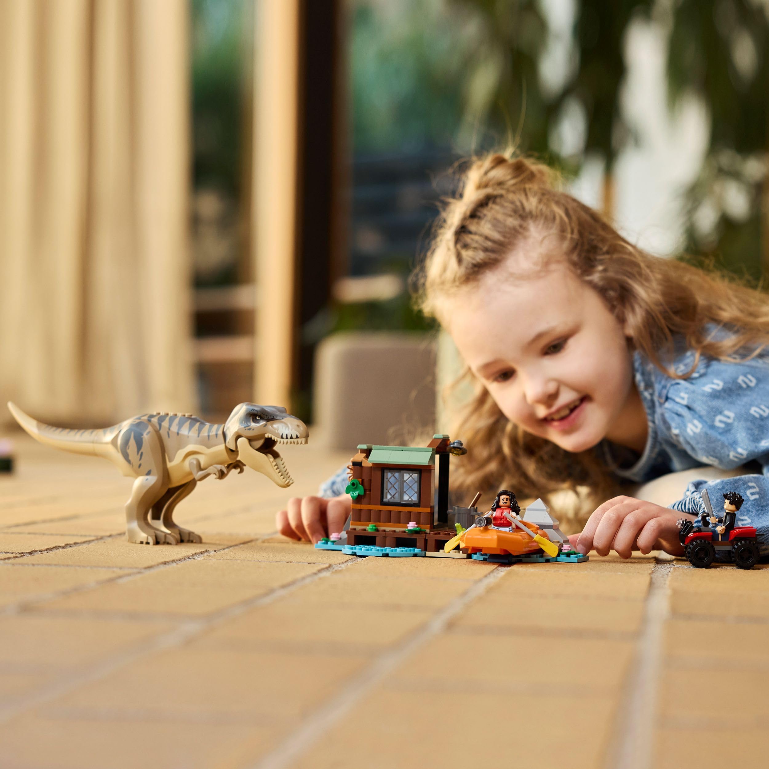 LEGO Jurassic World Huida por el Río y T. Rex a la Caza - Figura de Dinosaurio de Juguete Interactivo, Barco, Quad y 2 Minifiguras - Regalo de Cumpleaños para Niños y Niñas de 5+ Años 76975