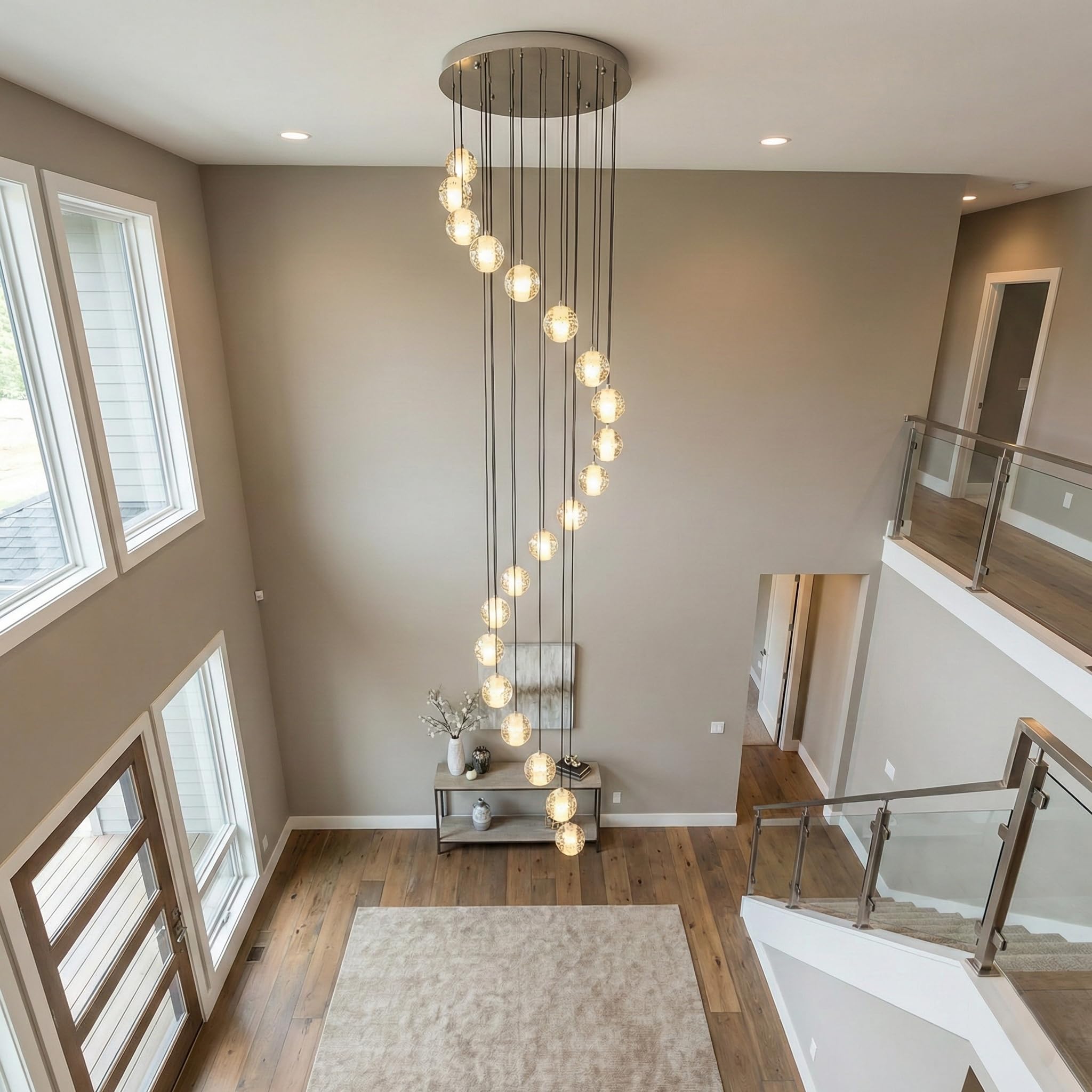 Photo 1 of SKFWAITKW 20-Light Crystal Chandelier for High Ceilings, Adjustable 5.9" to 120" Modern Bubble Crystal Staircase Chandelier, Dimmable Raindrop Pendant for Foyer, Stairwell, Living Room, Chrome