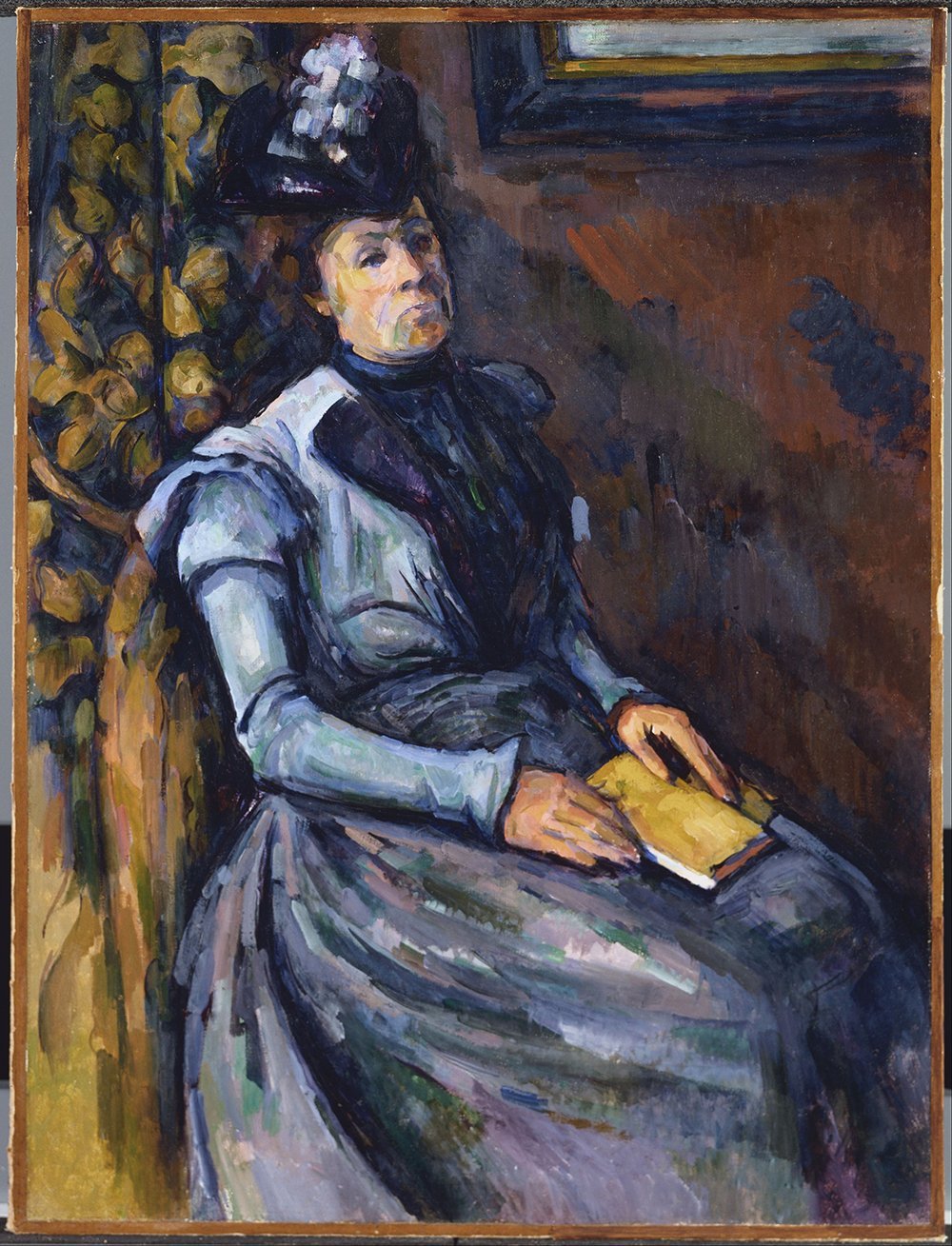 Lámina Seated Woman in Blue de Paul Cézanne, la solución mate sin reflejos para tu pared
