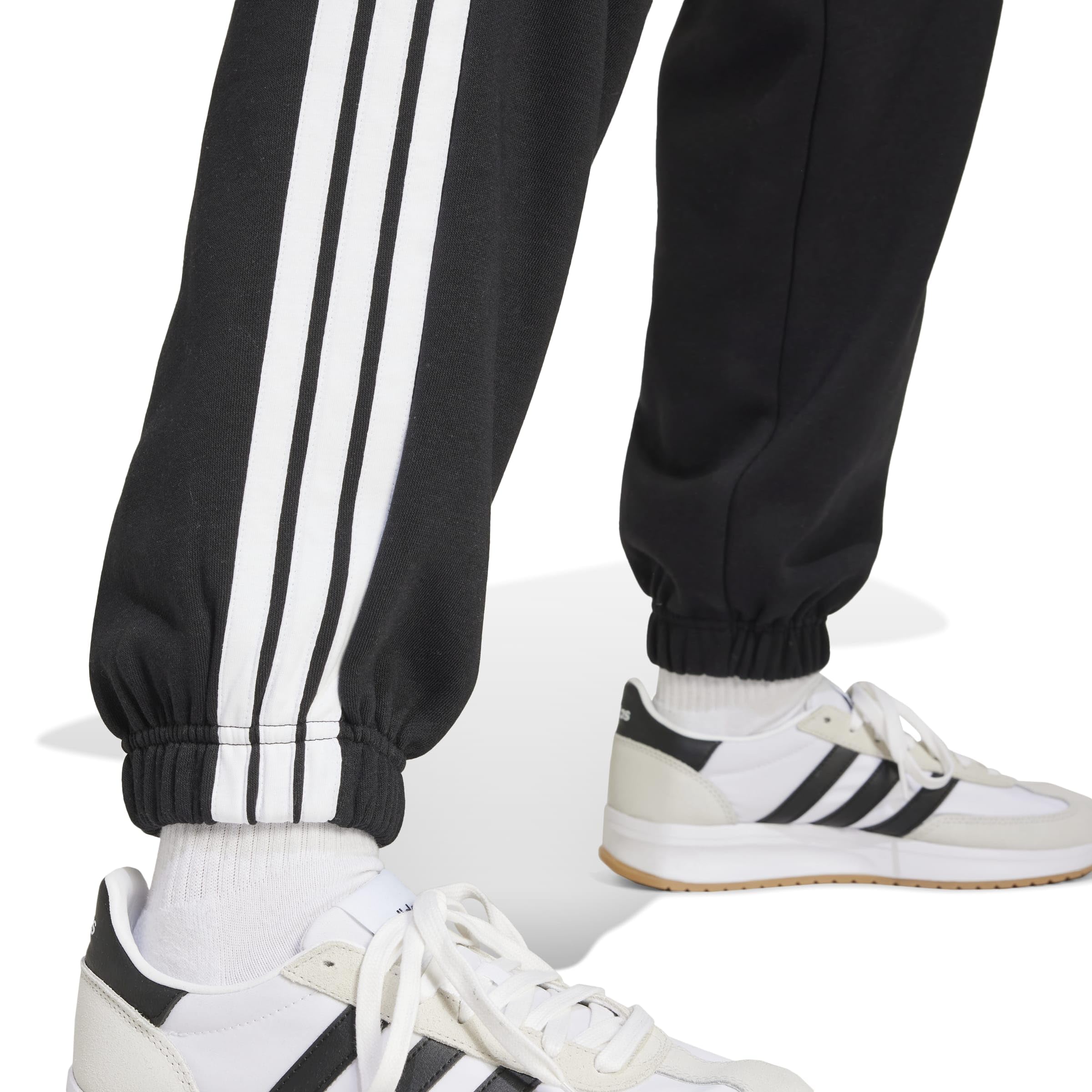 adidas ESSENTIALS 3-STRIPES FLEECE LOOSE PANTS - Spodnie golfowe Kobiety