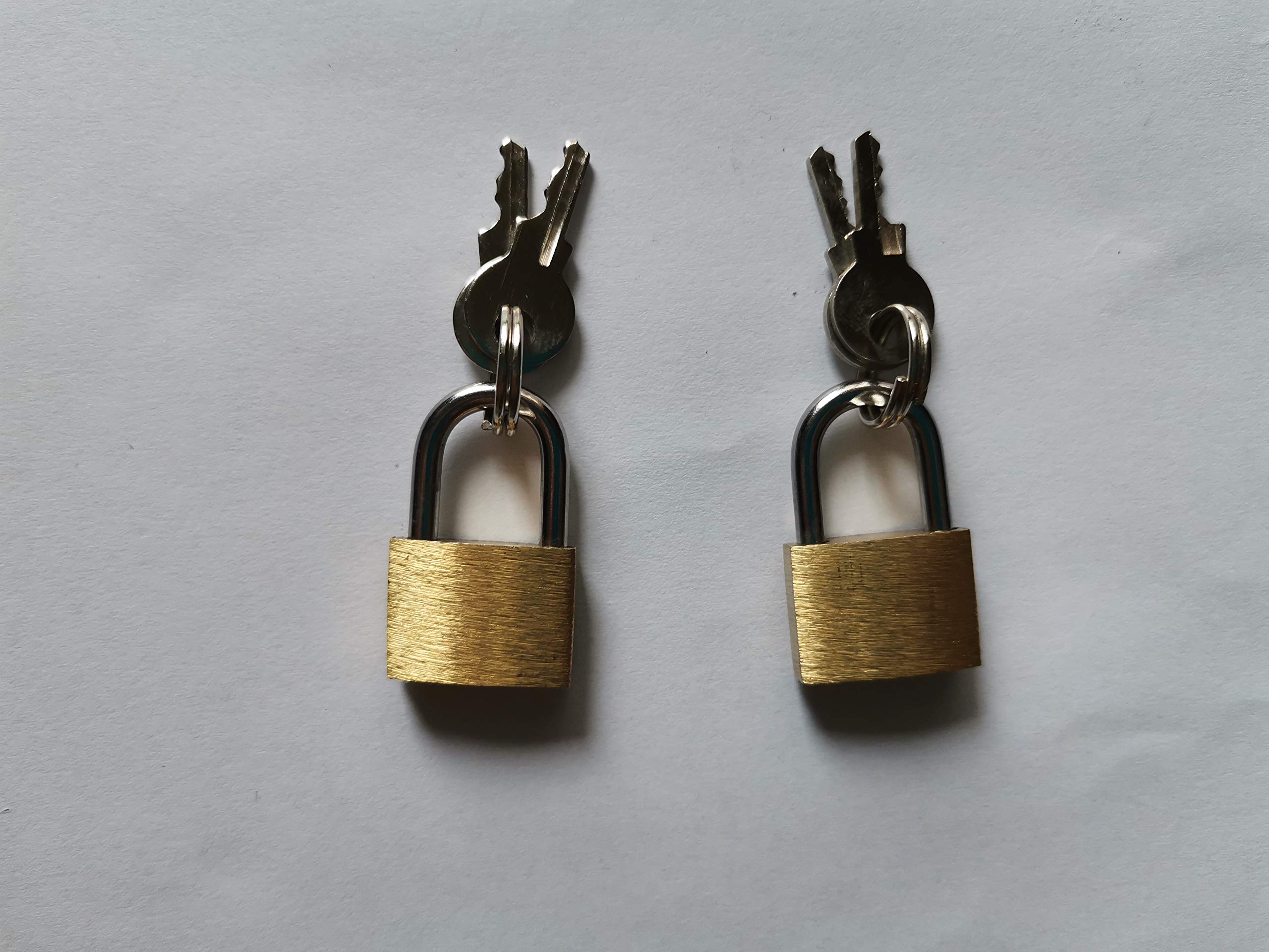 Un par de esposas de acero inoxidable para BDSM y hombres (7 x 5 cm).