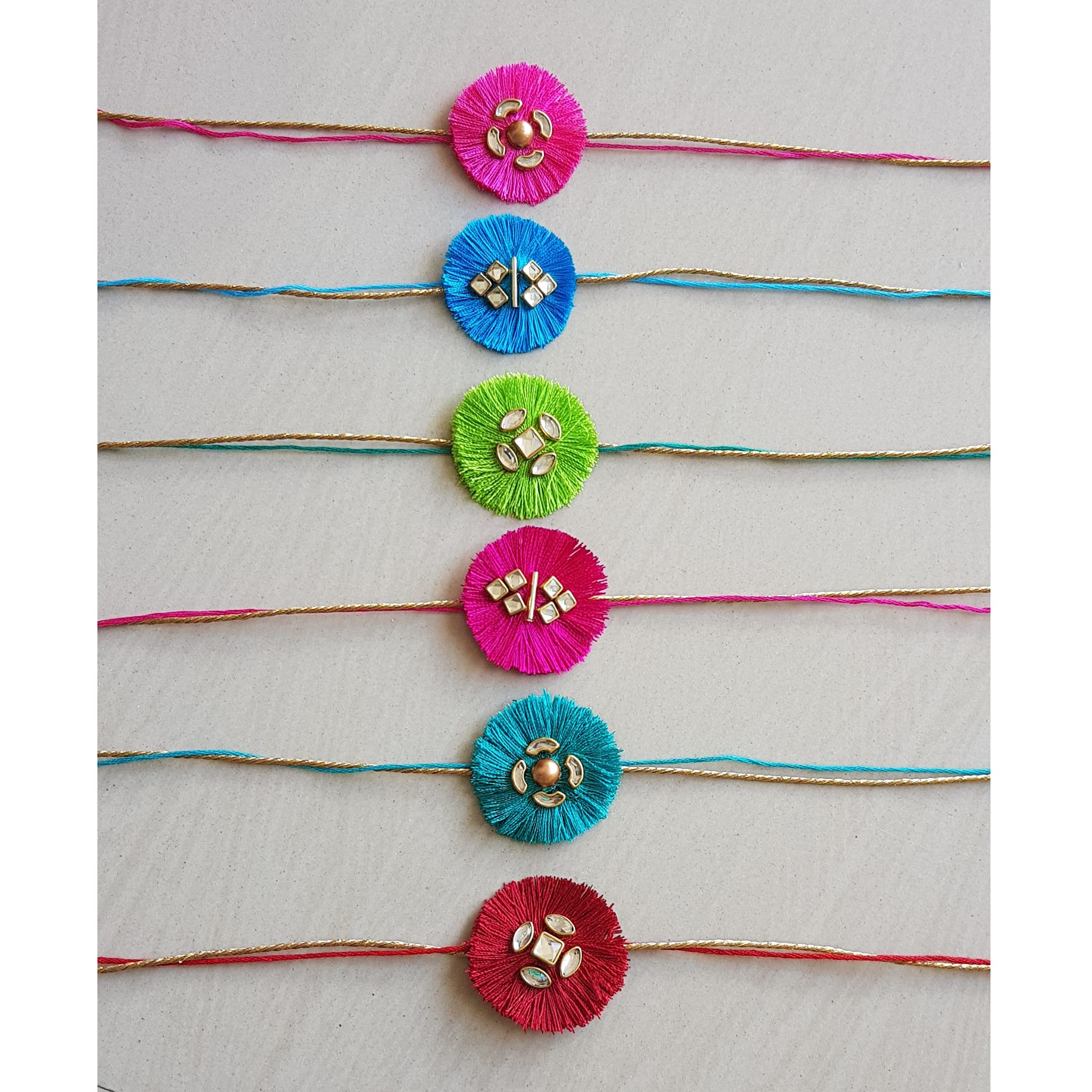 CREATIVE HANDICRAFTCREATIVE HANDICRAFT Silk Colorful Rakhi for Rakshabandhan Festival with Roli - Pack of 6