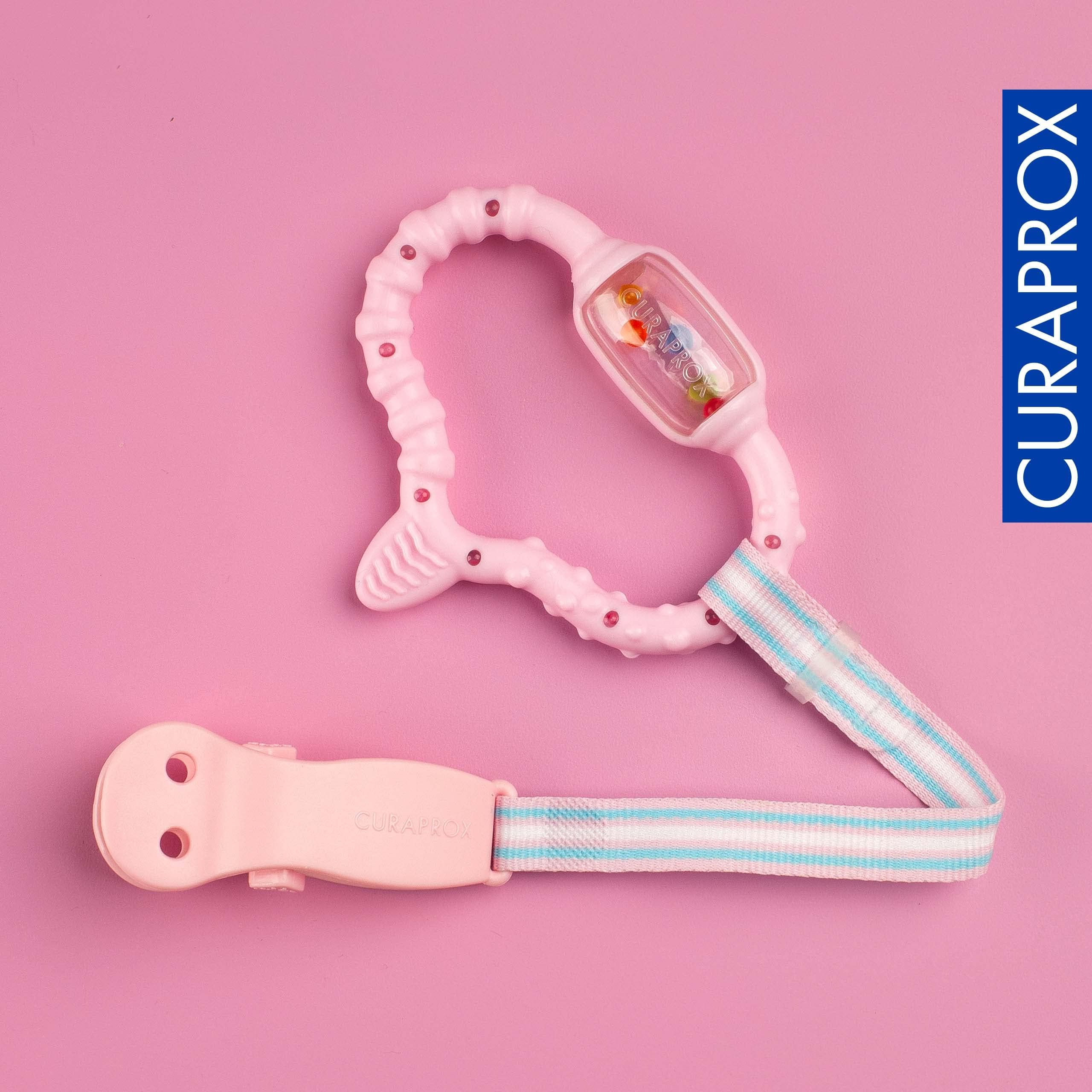 Curaprox Baby Dentizione Anello-Per neonati 0-24 mesi/Lenisce dentizione disagio e incoraggia le capacità motorie/BPA-Free, Rosa, con la formazione spazzolino da denti | Made in Switzerland