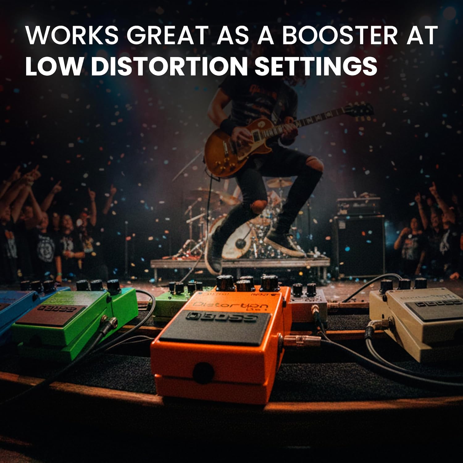 BOSS DS-1 Distortion Pedal on a pedalboard with a foot pressing the switch