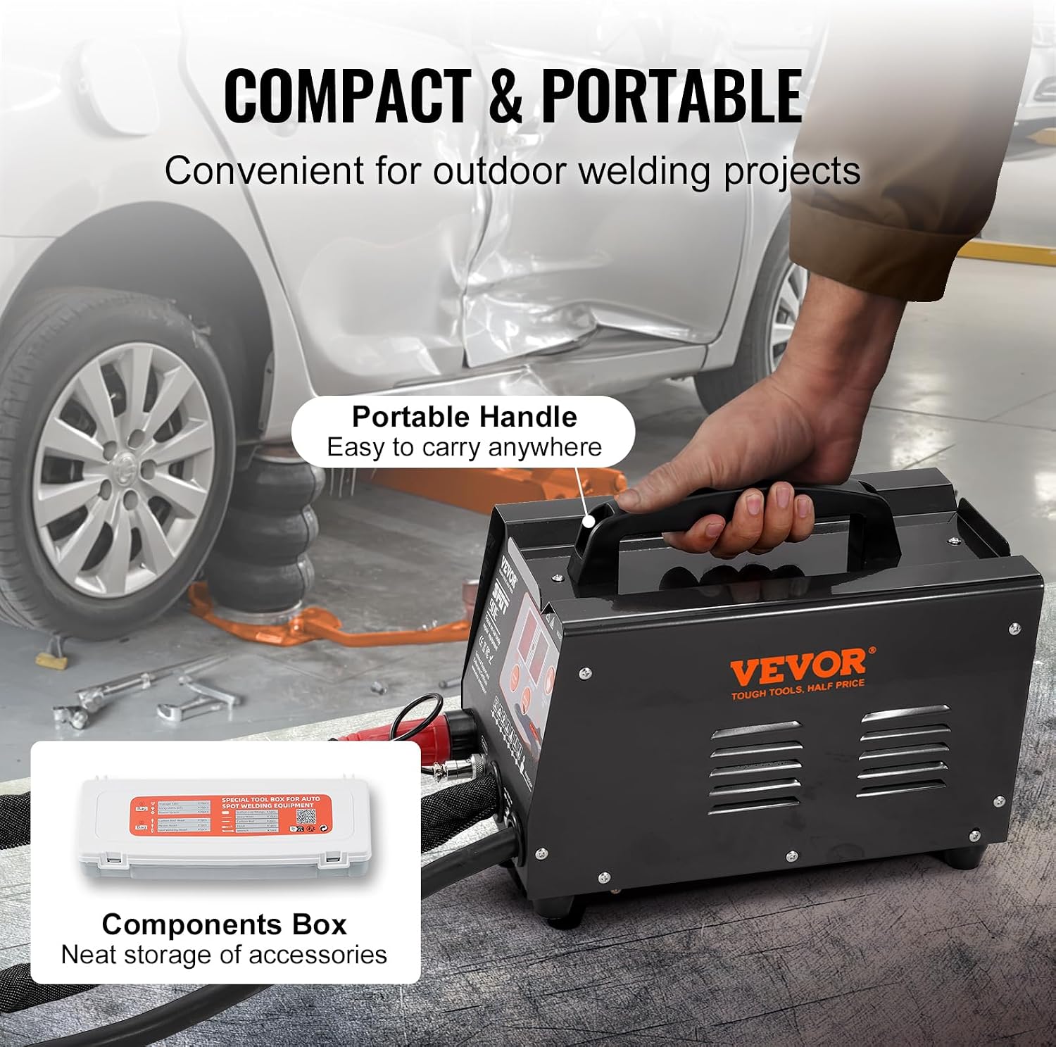 A person carrying the VEVOR 3KW Spot Welder Dent Puller by its handle, demonstrating its portability.