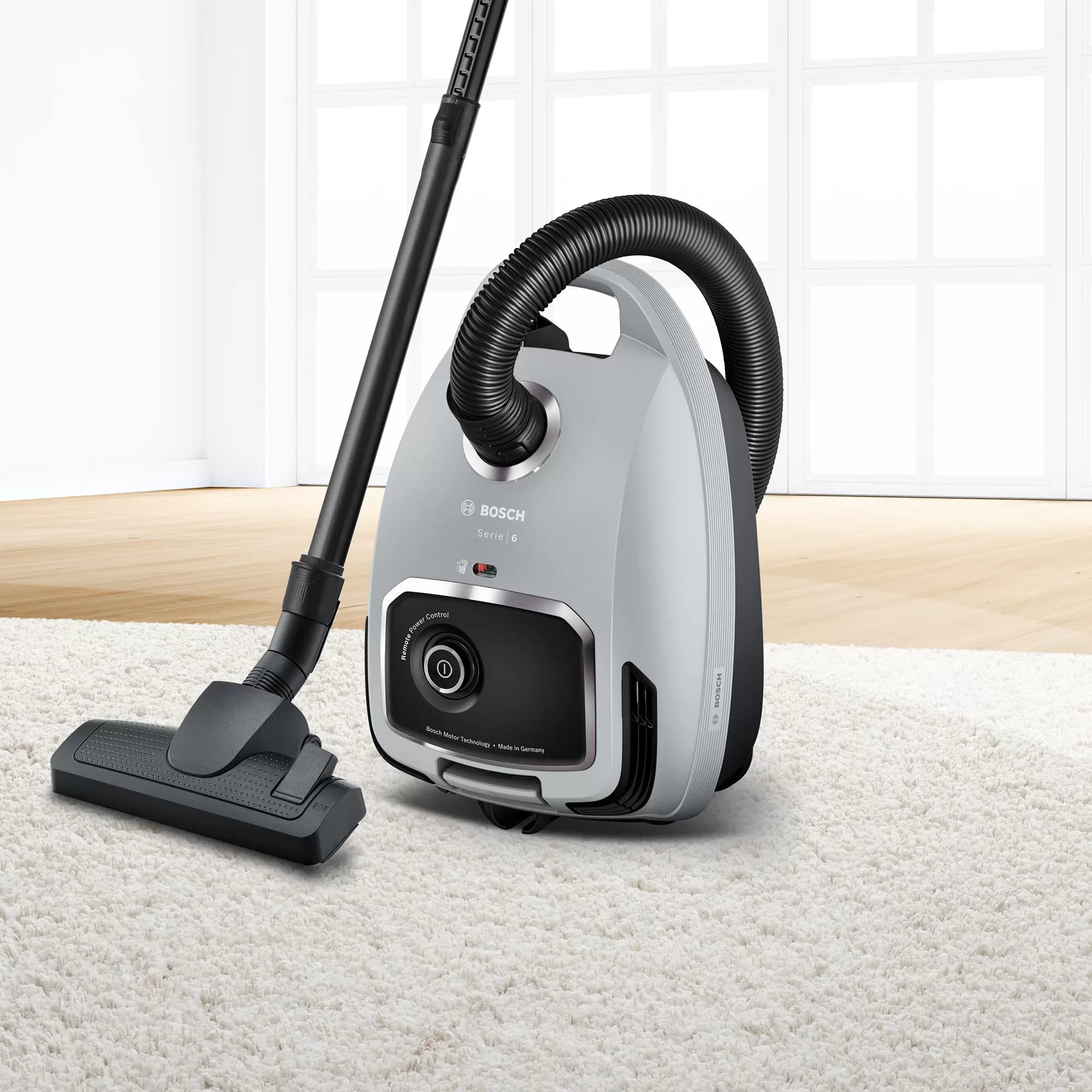 Bosch BGB6X330 - Aspirapolvere con sacchetto, 4 l, 600 W, filtro HEPA 75 dB, cavo da 12 metri, colore: Grigio