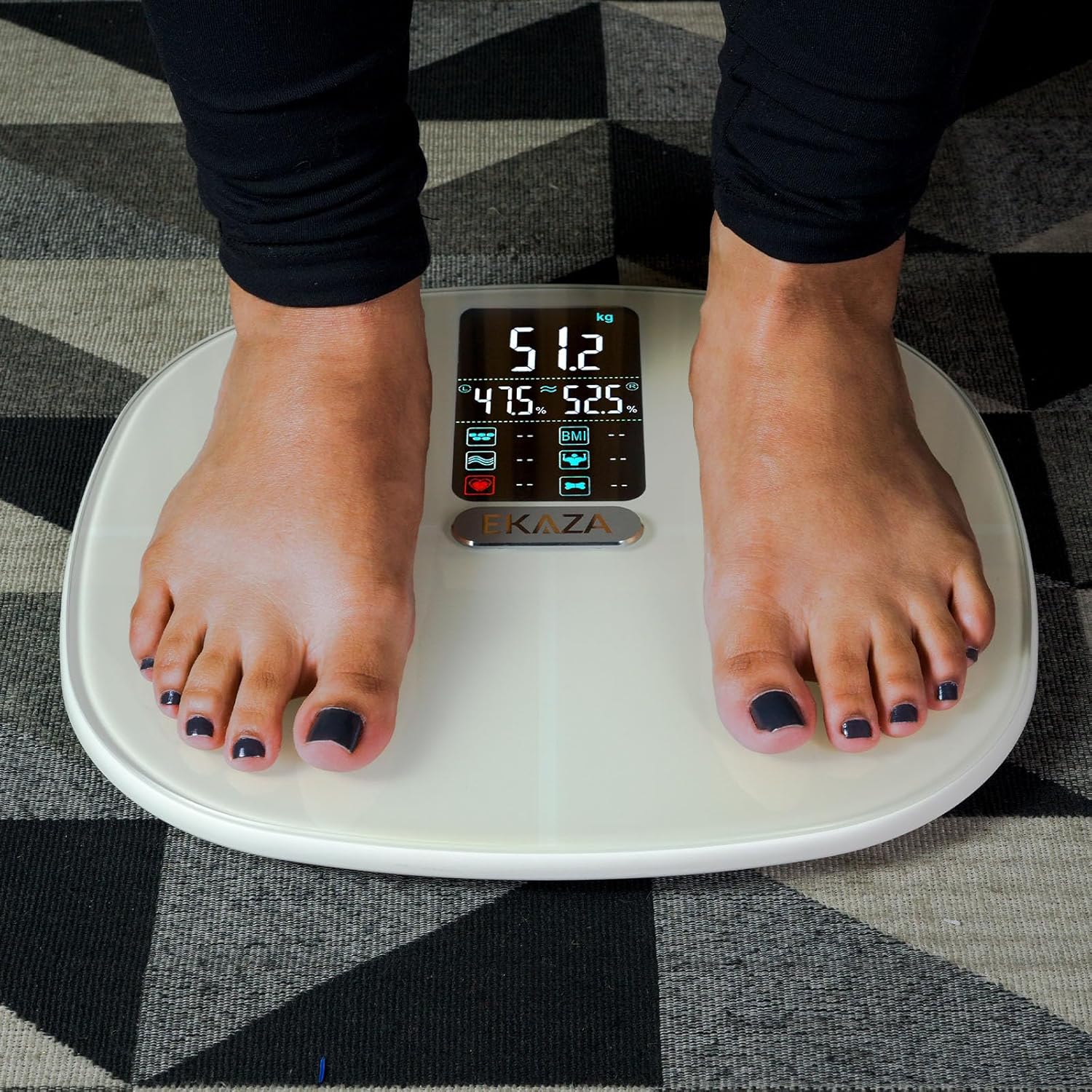 Feet on EKAZA Smart Body Composition Scale showing a weight reading