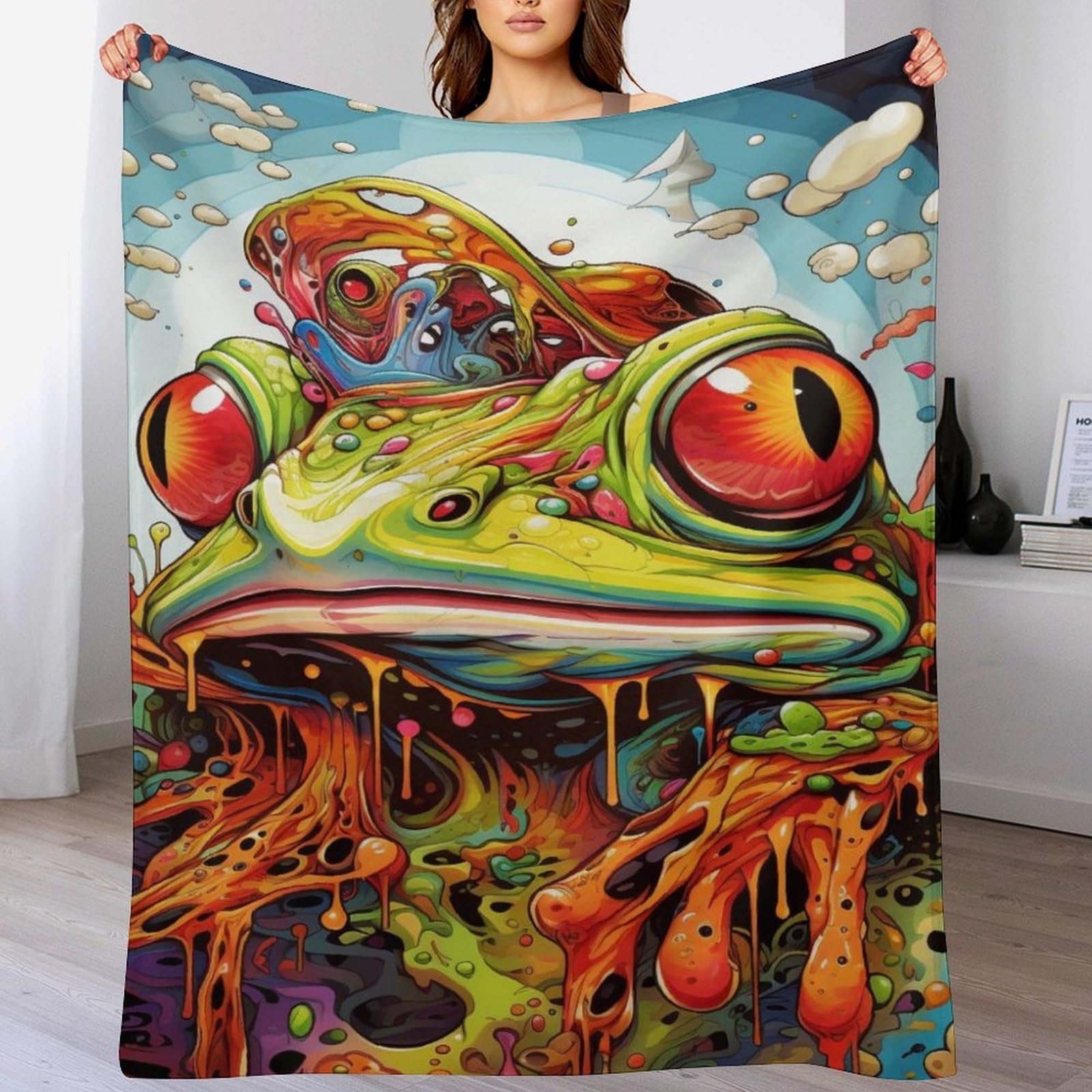 Couverture polaire grenouille pour des soirées cocooning douillettes au canapé