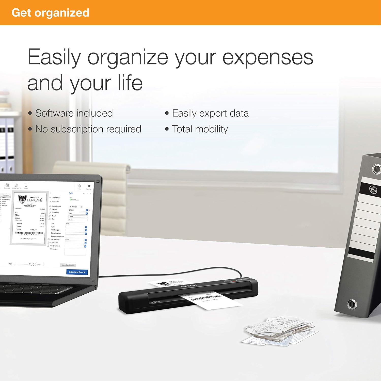Organized desk with Epson ES-55R scanner connected to a laptop