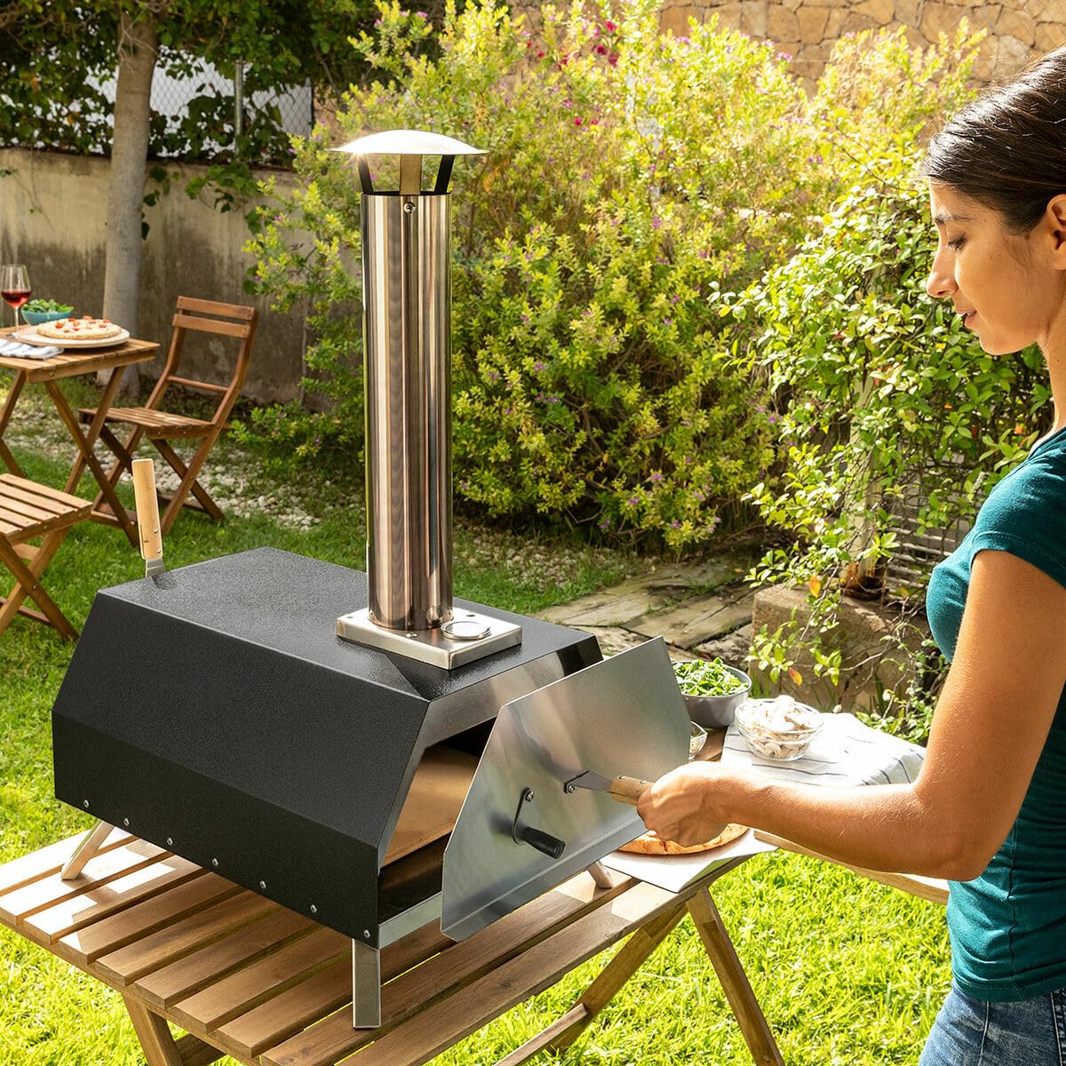 InnovaGoods® Horno pizza de pellets con accesorios, horno para pizza con Base de Piedra Ø 30cm máx. Rápida Cocción Hasta 500ºC y Pala para pizza de 30x30cm. Incluye Chimenea y Bolsa de Transporte.