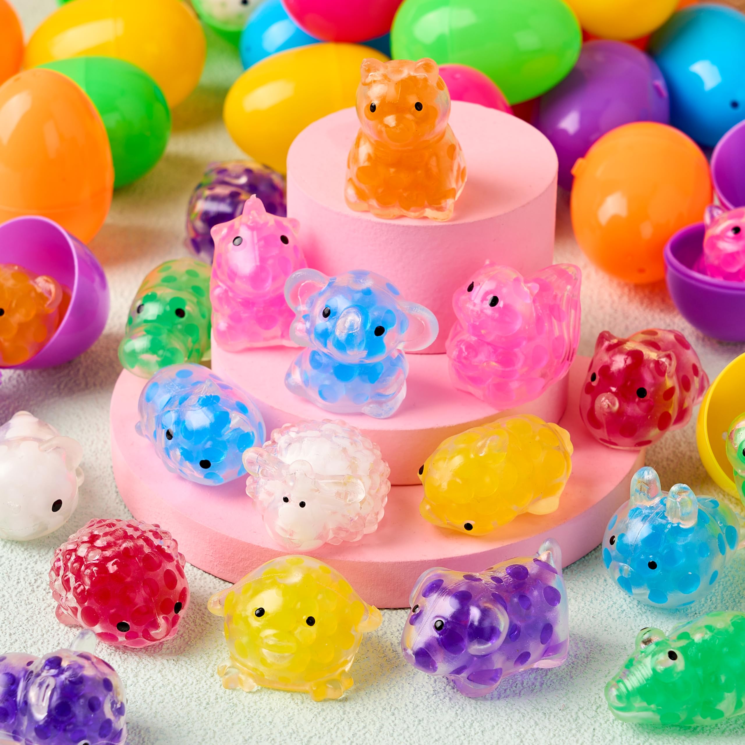JOYIN Lot de 24 œufs de Pâques pré-remplis avec jouets à écraser mochi pour la chasse aux œufs de Pâques, remplissage de panier, cadeau de fête, soulagement du stress, prix pour la salle de classe