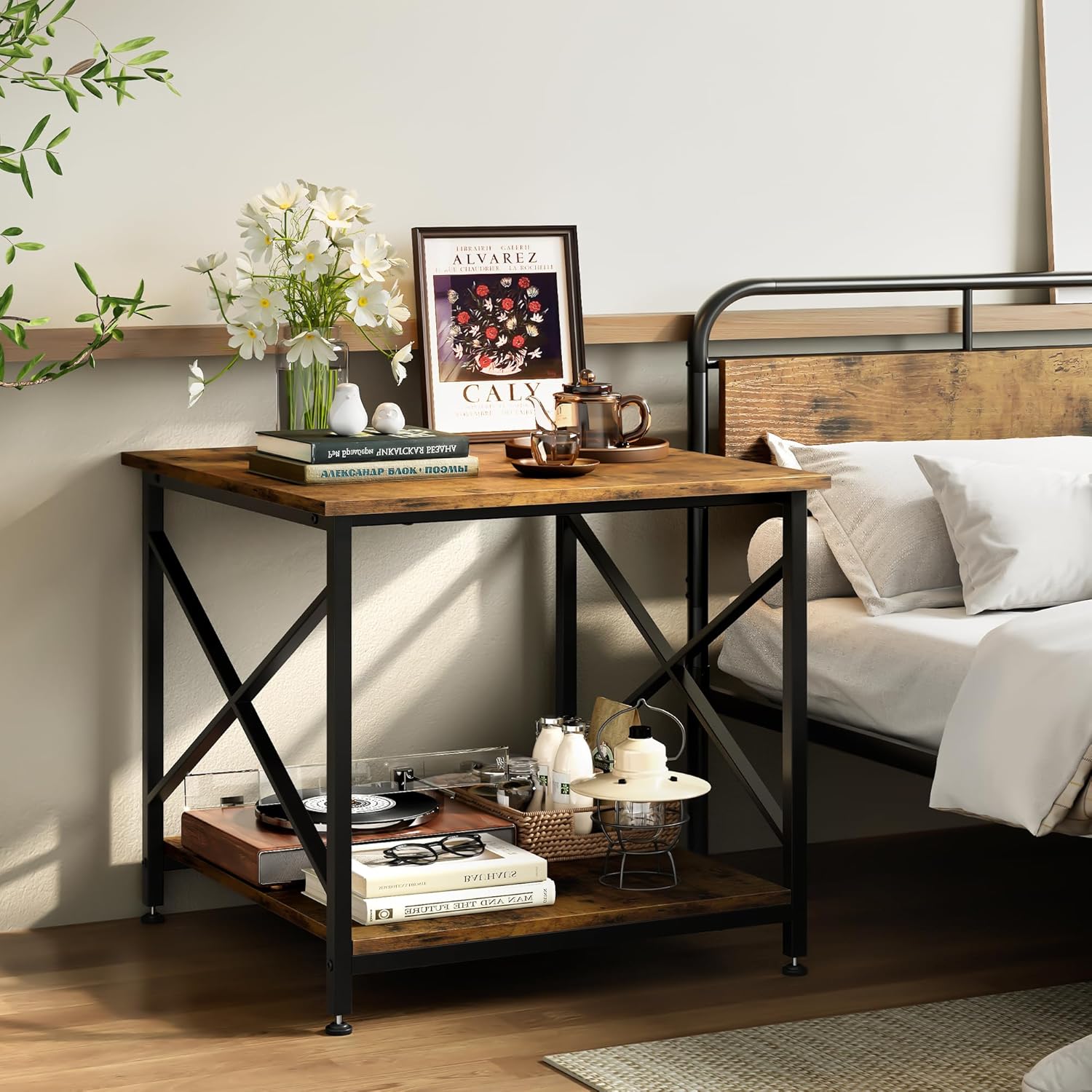 Printer stand used as a nightstand next to a bed