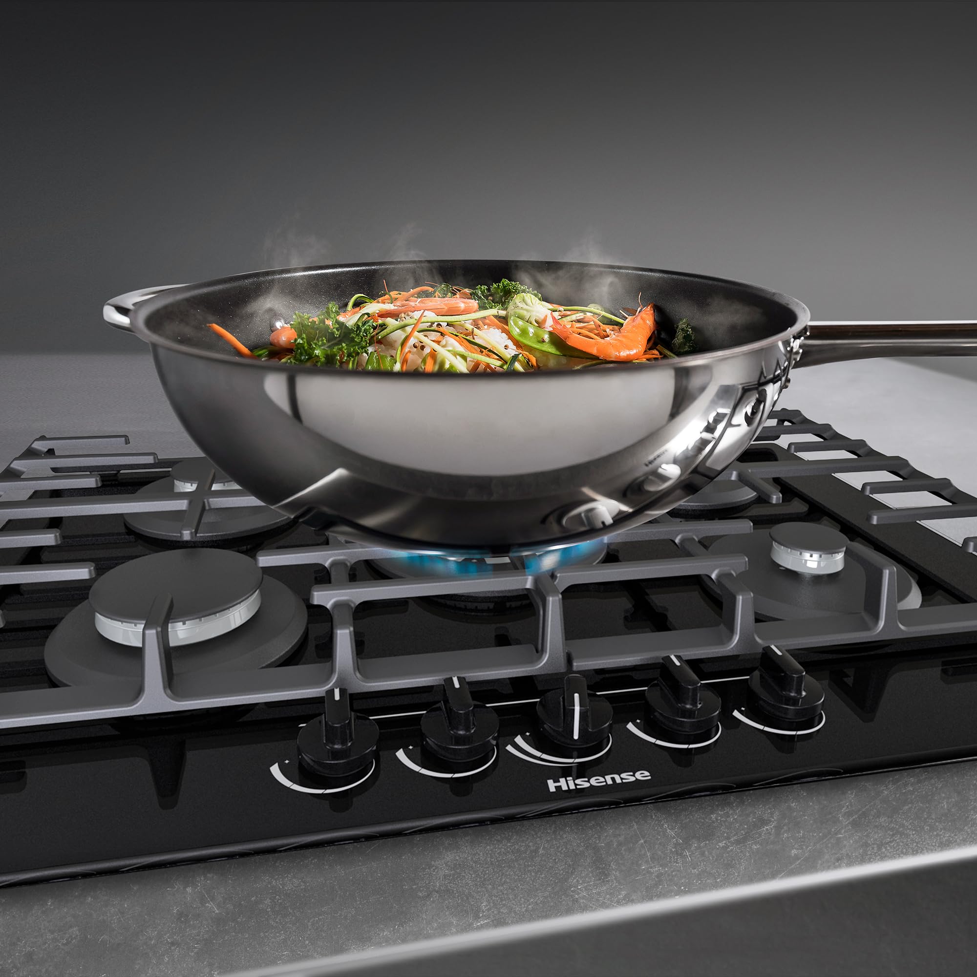 Hisense GG773B - Placa de Gas 5 Zonas, 1000W, Fondo 52cm, 5 Quemadores de Gas, Soporte de Hierro Fundido, Encendido con una mano, Quemador Wok, Superficie de fácil limpieza, Cristal Negro