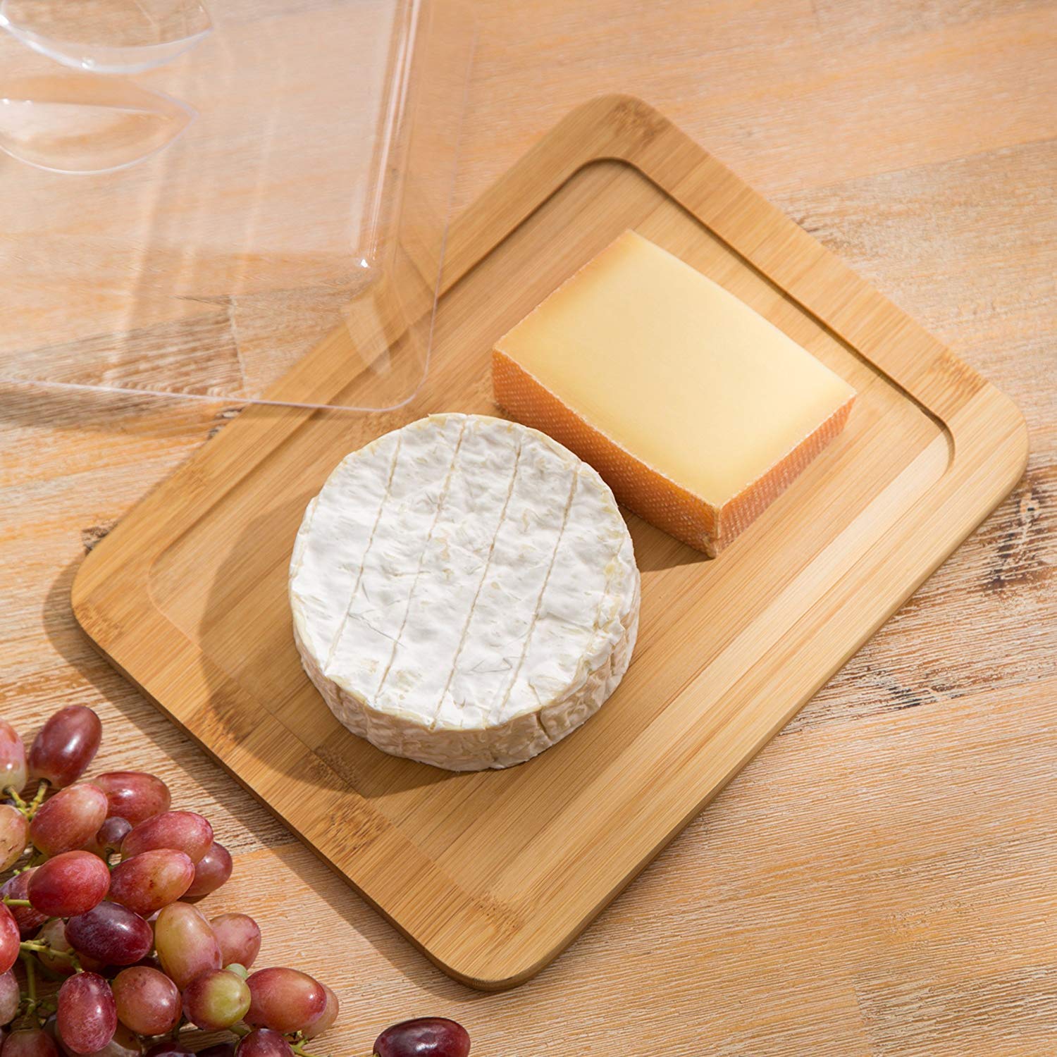 Jonas - Käseglocke / Käsedose / Käse Servierplatte / Bambus Schneidebrett - mit Deckel - Ideal für die Aufbewahrung von Käse oder andere Feinkosten - Abmessungen: 26 x 20 x 7,3 cm LxBxH