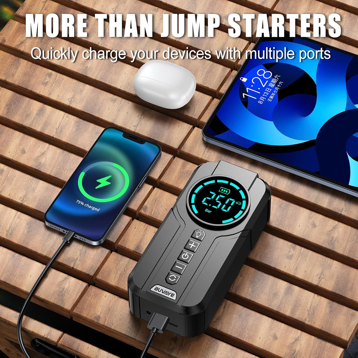 BUVAYE jump starter charging a smartphone and a tablet simultaneously, demonstrating its power bank functionality.