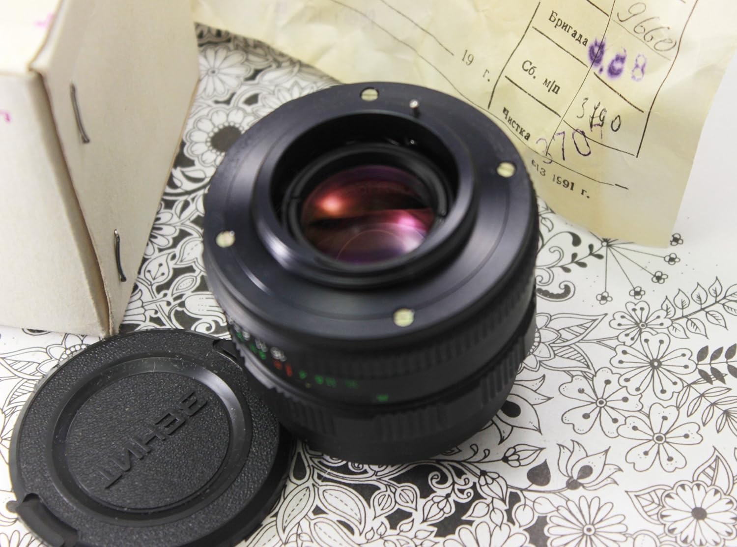 Helios 44M-6 58mm F2 lens with front and rear caps