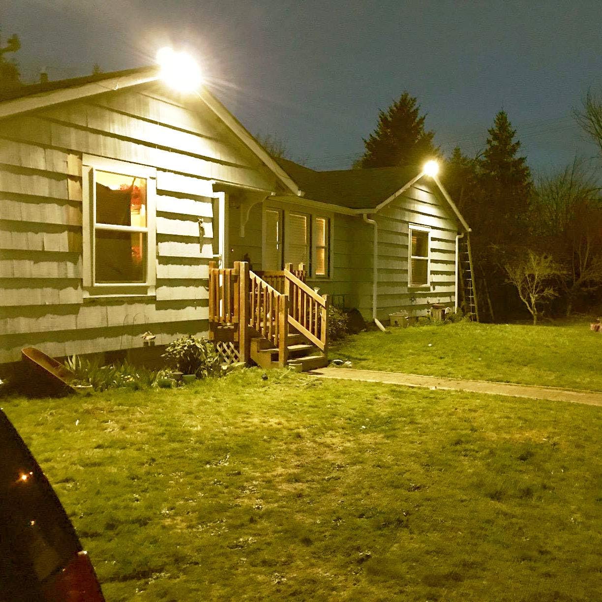 SOLLA LED Flood Lights illuminating a house exterior at night