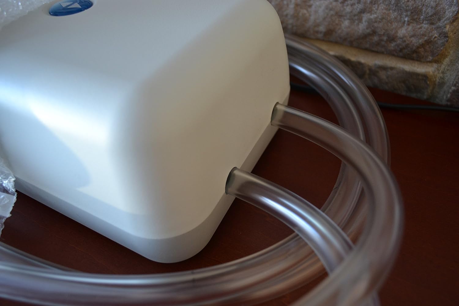 Close-up of air hose connection ports on the pump