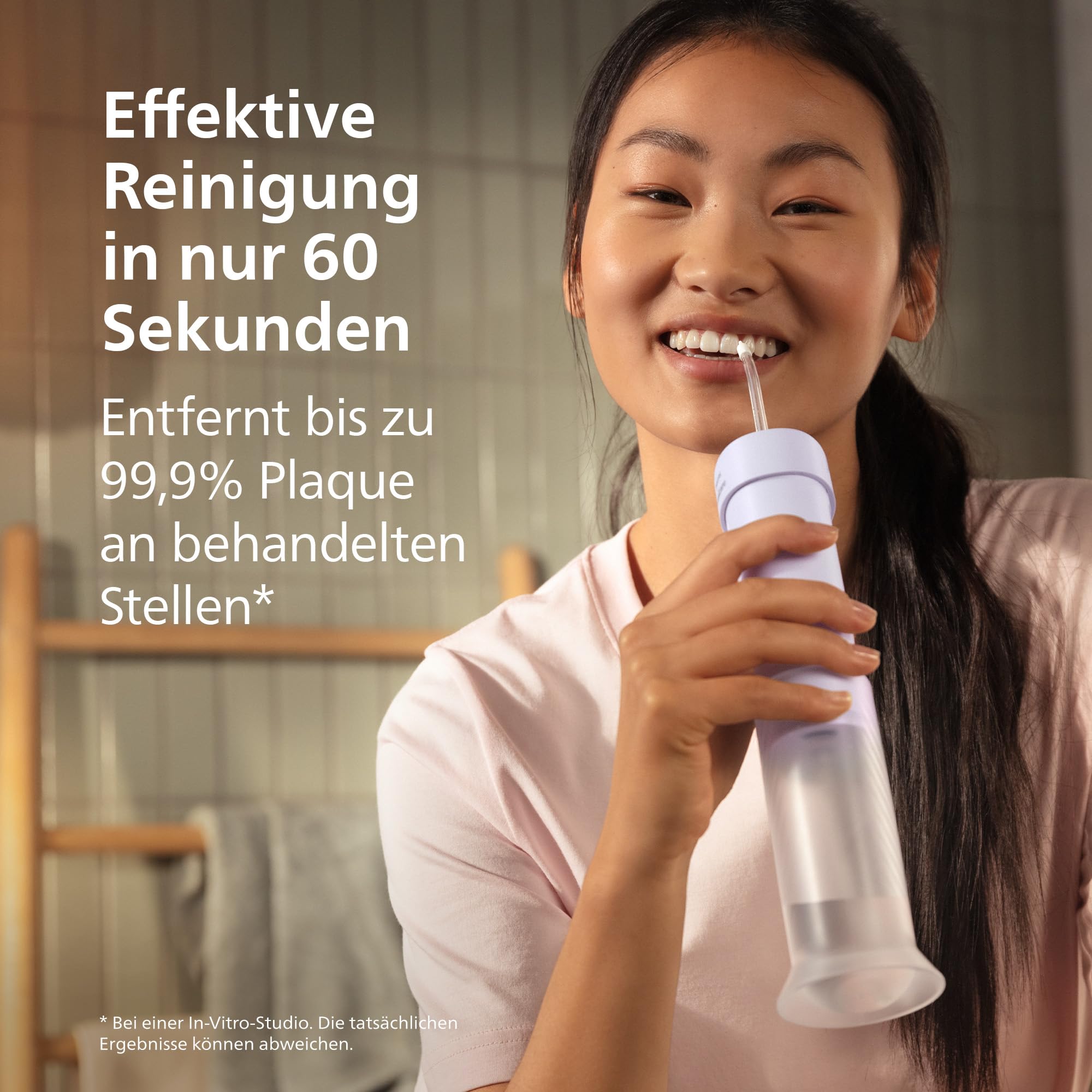 Philips Sonicare Compact Flosser 1000, tragbare Munddusche mit 3 Reinigungsprogrammen, IPX7 wasserdicht, reisefreundlich, Lila, Modell HX3333/23