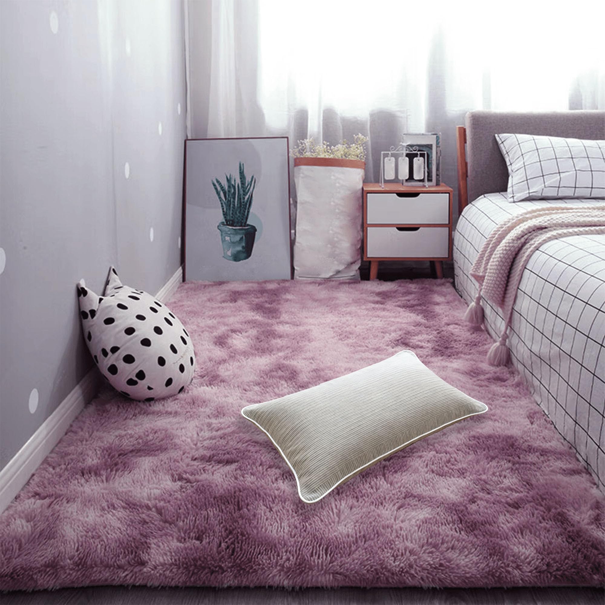 Tapis de sol doux rose pourpre pour creer un coin lecture cocooning dans une chambre de fille