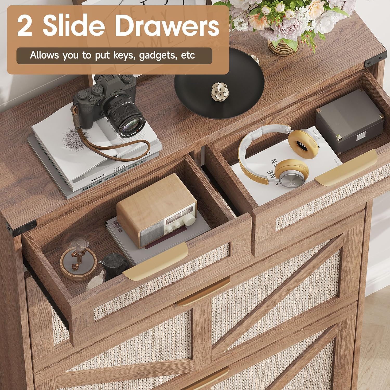 Close-up of the two top slide drawers, one open revealing small items like keys and headphones.