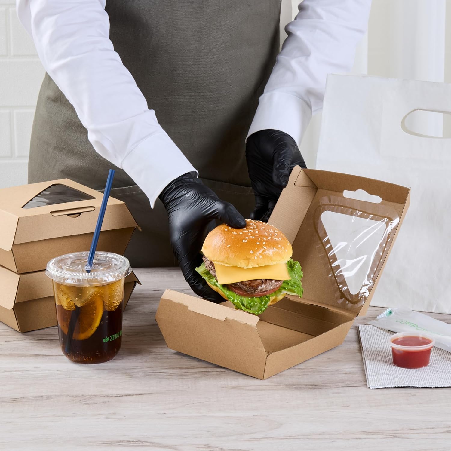 Restaurantware Clamshell Food Container 100 Count 5.41 x 5.5 x 2.63 Inches Paper Corrugated Take-Out Box Disposable Kraft Greaseproof Food Box For Burgers And Sandwiches
