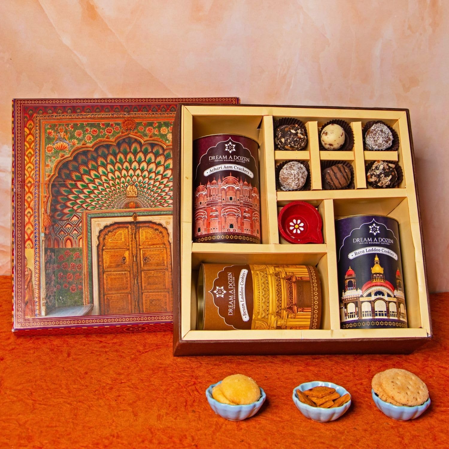 Dream a Dozen Jaipur’s Treasure Gift Hamper | Premium Diwali Gift Box with Rava Laddoo Cookies, Besan Laddoo Cookies, Achari Aam Crackers, Maharani Chocolate Truffles, Diya & Festive Greeting Card | Luxury Indian Gourmet Gift for Family, Friends, Clients & Employees | Corporate Diwali Gifts-image-49