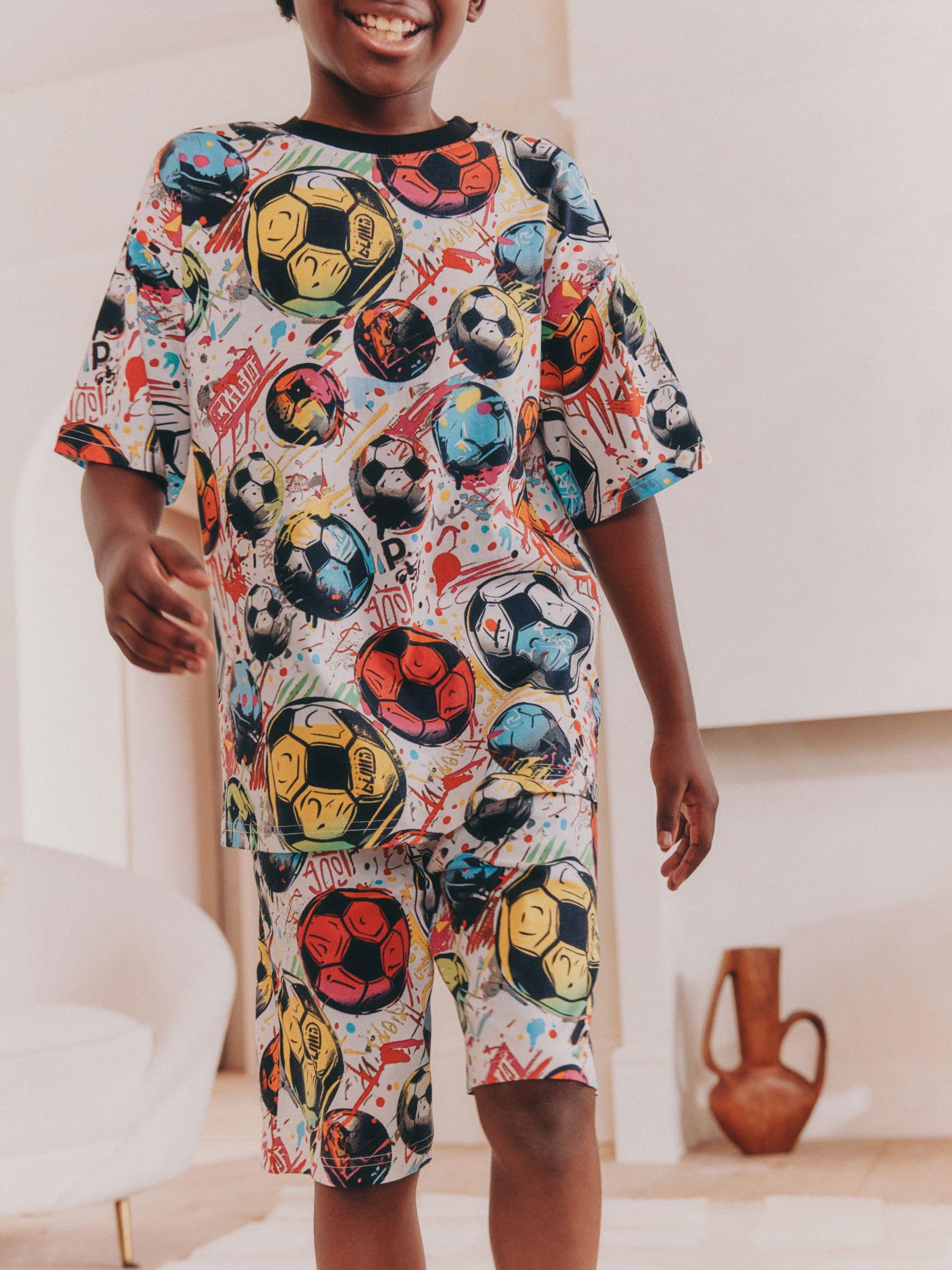 NEXT Niños Futbol Pack de 2 Pijamas con Pantalones Cortos 100% algodón