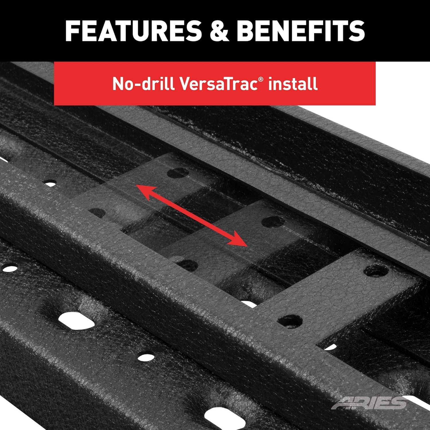 Close-up of the underside of the running board showing the VersaTrac channel and a C-shaped mounting plate being inserted and slid into position.