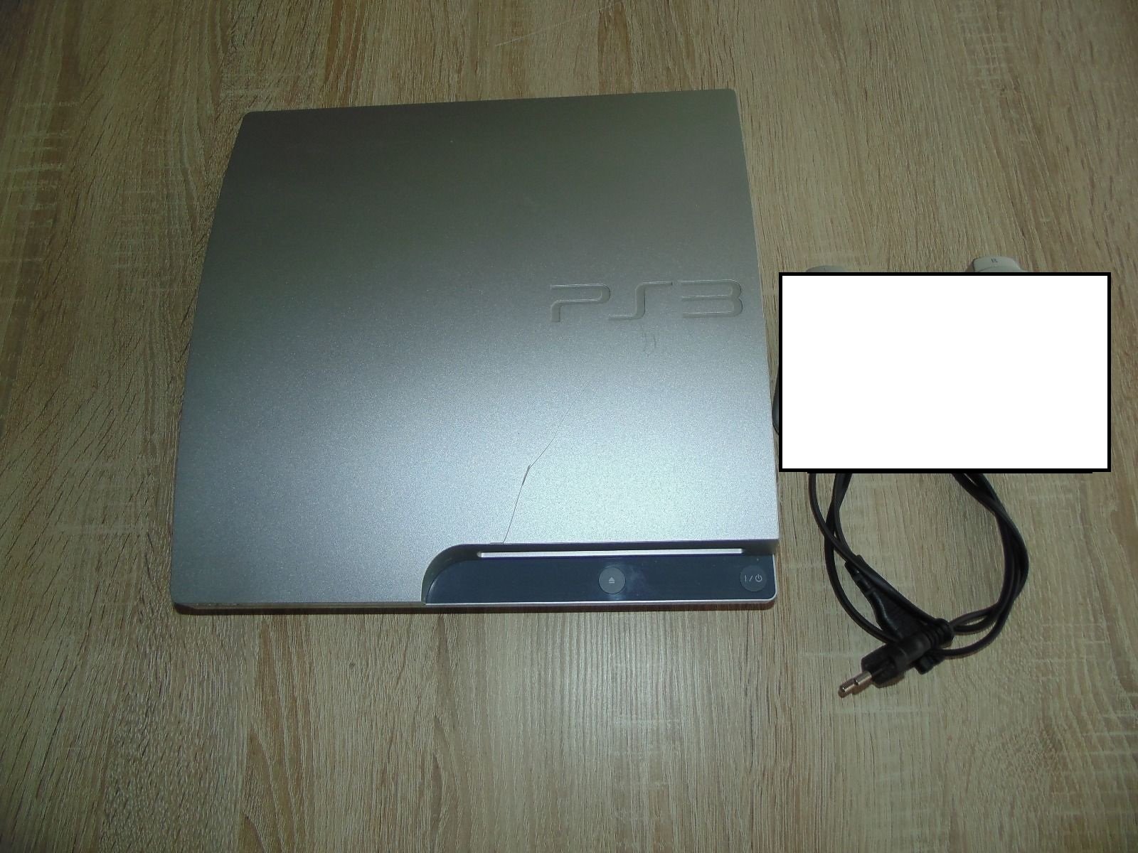 Console PS3SLIM 320 Go argent, Manettes PS3 Dual Shock 3 (argent)