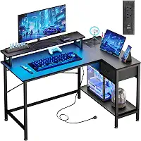 Fixwal Mesa de jogos em forma de L com tomadas elétricas e luzes LED, mesa de computador de 109 cm com porta de carregamento, mesa de canto pequena com gaveta e prateleira, mesa de escritório em casa