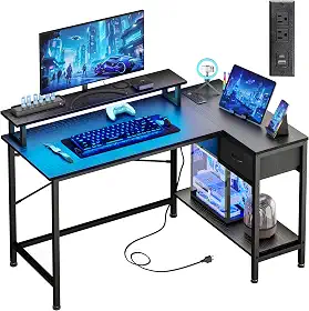 Fixwal Mesa de jogos em forma de L com tomadas elétricas e luzes LED, mesa de computador de 109 cm com porta de carregamento, mesa de canto pequena com gaveta e prateleira, mesa de escritório em casa