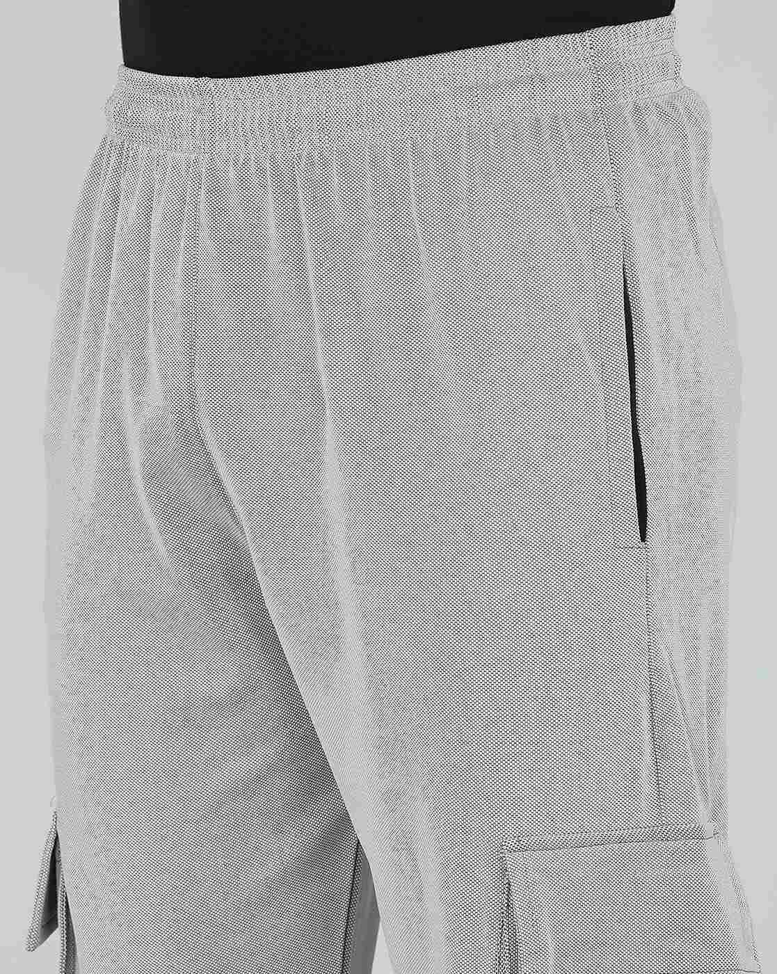 Libja Mens Cargo Pant | Loose Starting Fit | Durable Polyester Fabric | Baggy Trendy Style for GenZ | Perfect for Monsoon Diwali Festivals | Style with T-Shirt or Shirt | Sizes 28 to 36 Libja Mens Cargo Pant | Loose Starting Fit | Durable Polyester Fabric | Baggy Trendy Style for GenZ | Perfect for Monsoon Diwali Festivals | Style with T-Shirt or Shirt | Sizes 28 to 36