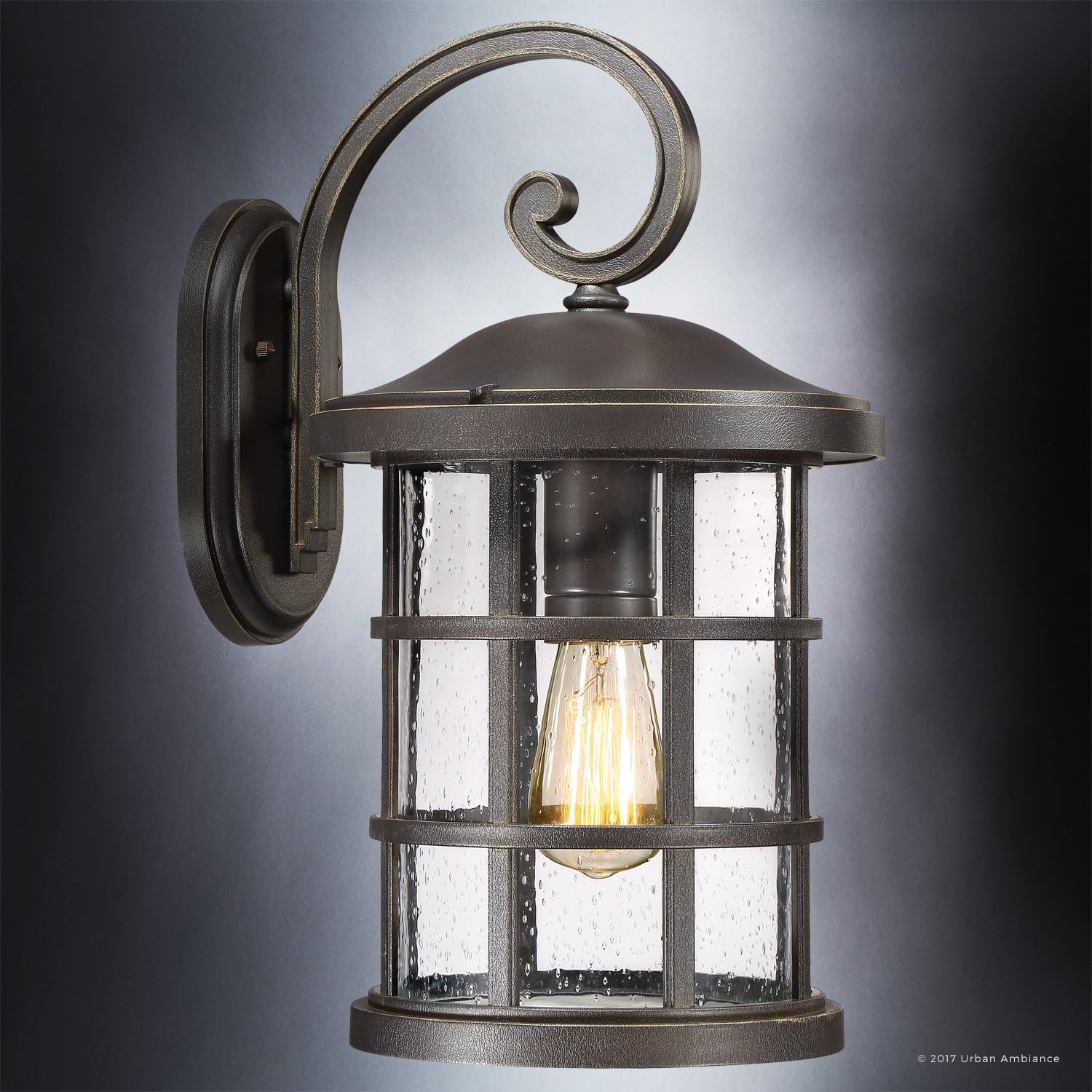 Flash Sale Luxury Craftsman Outdoor Wall Light, Medium Size: 17.75H x 10W, with Tudor Style Elements, Wrought Iron Design, Oil Rubbed Parisian Bronze Finish and Seeded Glass, UQL1045 by Urban Ambiance Best Cyber Deals 🔥 Luxury Craftsman Outdoor Wall Light, Medium Size: 17.75H x 10W, with Tudor Style Elements, Wrought Iron Design, Oil Rubbed Parisian Bronze Finish and Seeded Glass, UQL1045 by Urban Ambiance