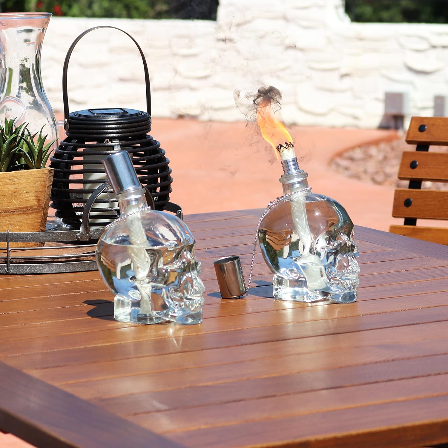 Sunnydaze Grinning Skull Glass Tabletop Torches - Outdoor Patio Lighting - Includes Wicks and Attached Snuffers - Set of 4 Refillable Torches - Clear
