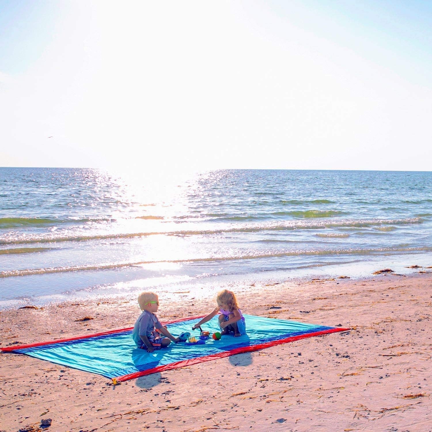 WolfWise Water-Resistant Beach Blanket, Extra Large 106“x82.5”Sand Escape Super Soft Nylon Beach Mat for Travel Camping Hiking Picnic, Lightweight Machine Washable with Corner Pockets, Blue