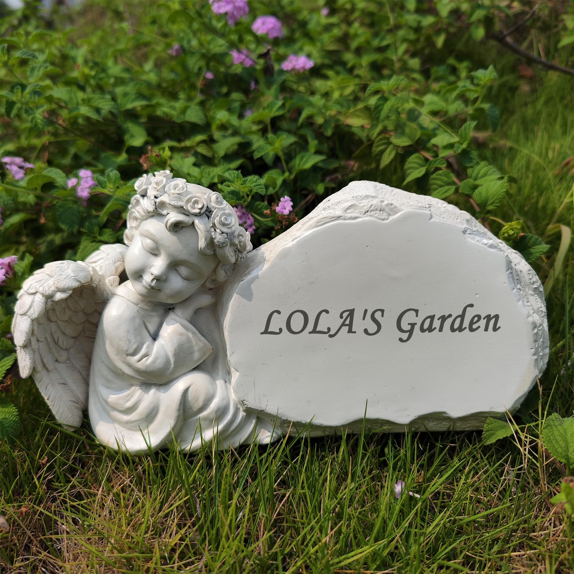 Memorial on the garden, die steine, die Engel, die steine in die steinschriftzeichen eingraviert die steingedenktafel, die steingedenktafel und die engelsstatuen, die den tag des mitgefühls an die luf