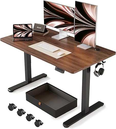 FEZIBO Escritorio de pie con cajón, 48 x 24 pulgadas, altura ajustable, escritorio eléctrico de pie con almacenamiento, escritorio de oficina en