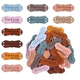 SAVITA 50pcs Handmade Leather Labels, Microfiber Colorful Leather Labels with Love Hearts Handmade Embossed Crochet Tags with Holes for Crafts Knitting Sewing Hats Purses Clothing (10 Colors)