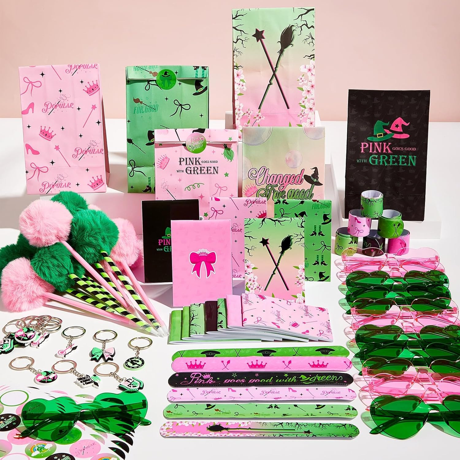 84pcs Pink and Green Witch Party Favors Birthday Decorations Pens Notepads Sunglasses Paper Gift Bag Key Chains Slap Bracelet Sticker Halloween Themed Party Supplies for Gift Party