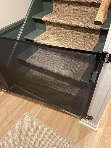 Retractable Baby Gate for Doorways and Stairs — shown in a real home setting for scale