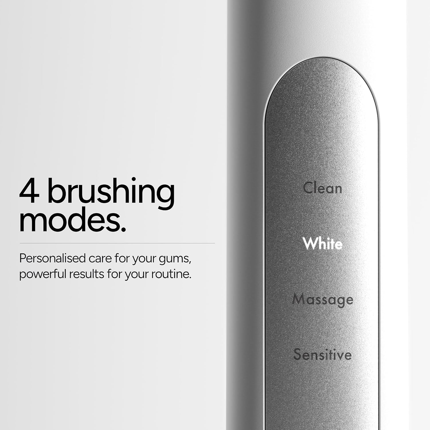 Close-up of the ORDO Sonic+ Electric Toothbrush handle showing the four brushing modes: Clean, White, Massage, Sensitive.